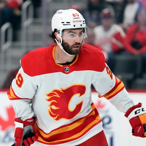 FILE - Calgary Flames center Dillon Dube (29) skates against the Detroit Red Wings in the first period of an NHL hockey game Sunday, Oct. 22, 2023, in Detroit. (AP Photo/Paul Sancya, File)