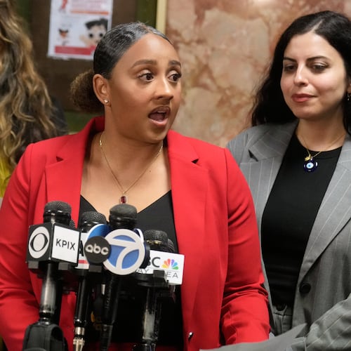 Public defenders Diamond Ward, foreground left, and Nuha Abusamra, right, representing, Daniel Moreno-Gama, speak to reporters outside of a courtroom on Tuesday, April 14, 2026, in San Francisco. (AP Photo/Jeff Chiu)