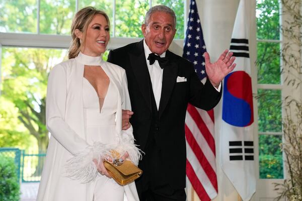 Arthur Blank and Jennifer Hale arrive for the State Dinner with President Joe Biden and the South Korea's President Yoon Suk Yeol at the White House, Wednesday, April 26, 2023, in Washington. (Alex Brandon/AP)