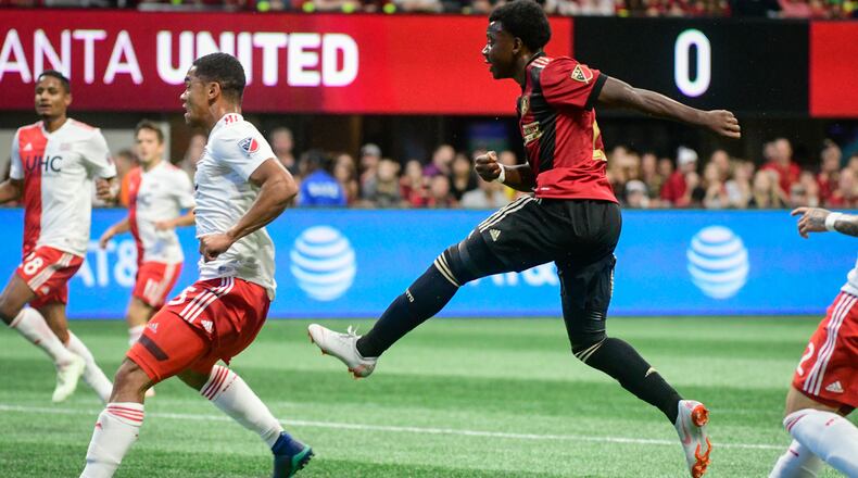 Atlanta United's George Bello follows through on a goal-scoring kick against the New England Revolution Saturday, Oct. 6, 2018, at Mercedes-Benz Stadium in Atlanta.