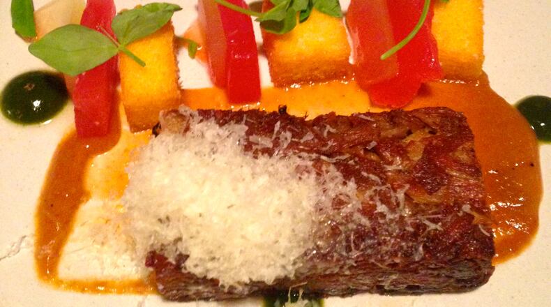 Pork shoulder with corn pudding and watermelon