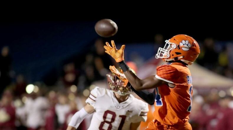 Parkview wide receiver Jared Brown (14) scores on a 49-yard touchdown catch in the first half against Brookwood at Parkview High School Friday, October 25, 2019 in Lilburn, Ga. (JASON GETZ/SPECIAL TO THE AJC)
