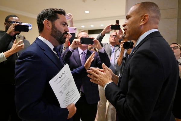 U.S. Rep. Michael Lawler, R-N.Y. (left) and House Minority Leader Hakeem Jeffries, D-N.Y., engaged in a heated discussion over the government shutdown on Wednesday in Washington.