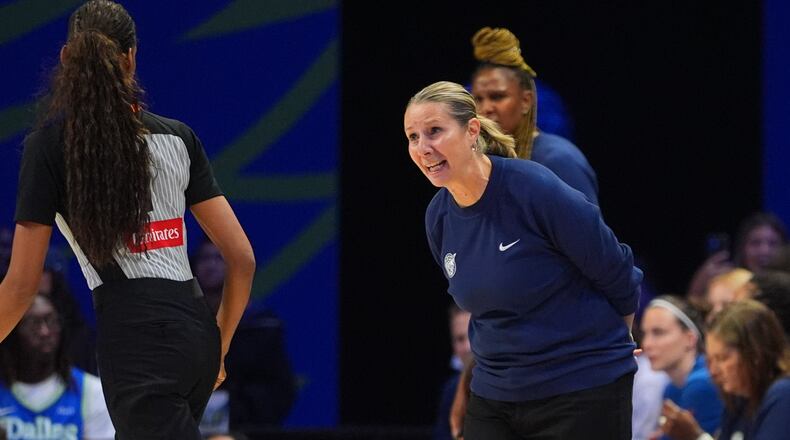 Minnesota Lynx head coach Cheryl Reeve, right, questions a call during the second half of a WNBA basketball game against the Dallas Wings in Arlington, Texas, Sunday, June 28, 2026. (AP Photo/LM Otero)