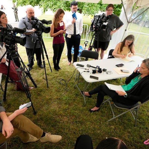 Maria DeLiberato, right, attorney for death row inmate Tony Von Carruthers, speaks to reporters after the execution of Carruthers was called off because a suitable vein could not found as required by lethal injection execution protocol Thursday, May 21, 2026, in Nashville, Tenn. (AP Photo/Mark Humphrey)