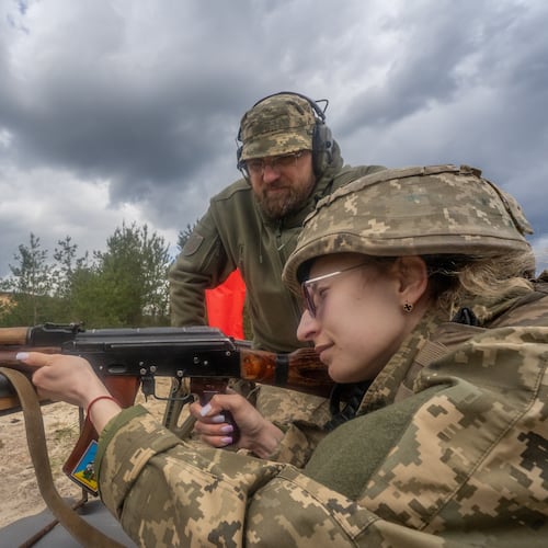 Local residents practice military skills at a training ground near the frontline town of Izium in the Donetsk region, Ukraine, Wednesday, April 29, 2026. (AP photo/Andrii Marienko)
