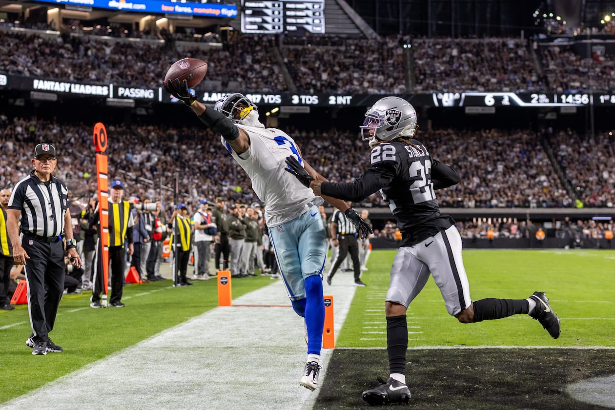 Cowboys wide receiver George Pickens (left) tries to catch a pass with one hand against the Raiders on Monday, Nov. 17, 2025, in Las Vegas. Pickens could not come down with the touchdown catch, but he had nine receptions for 144 yards and a TD in the win over Las Vegas. (Jeff Lewis/AP)