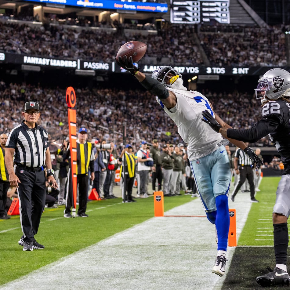Cowboys wide receiver George Pickens (left) tries to catch a pass with one hand against the Raiders on Monday, Nov. 17, 2025, in Las Vegas. Pickens could not come down with the touchdown catch, but he had nine receptions for 144 yards and a TD in the win over Las Vegas. (Jeff Lewis/AP)