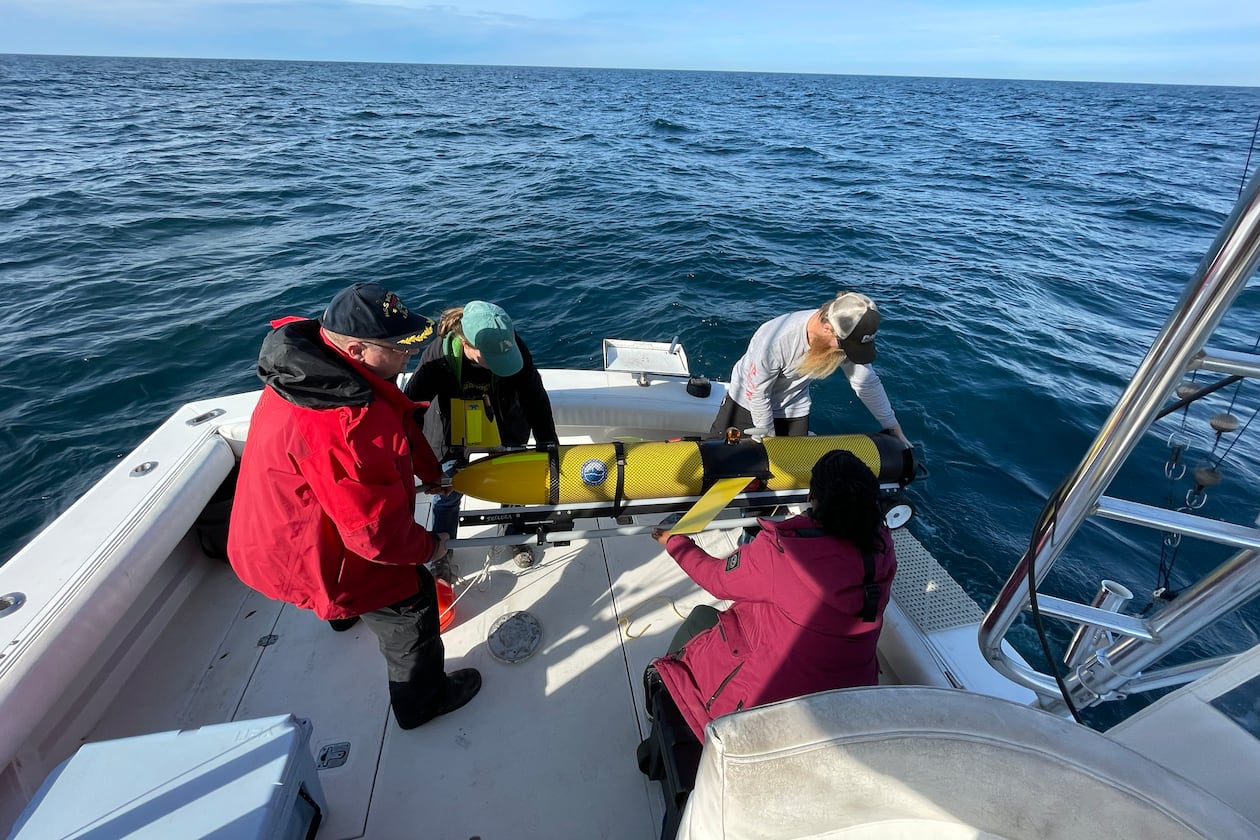 Researchers from the UGA Skidaway Institute and the University of South Carolina deploy a Teledyne G3 Slocum Glider in January 2023. (Photo Courtesy of the Catherine Edwards Lab)