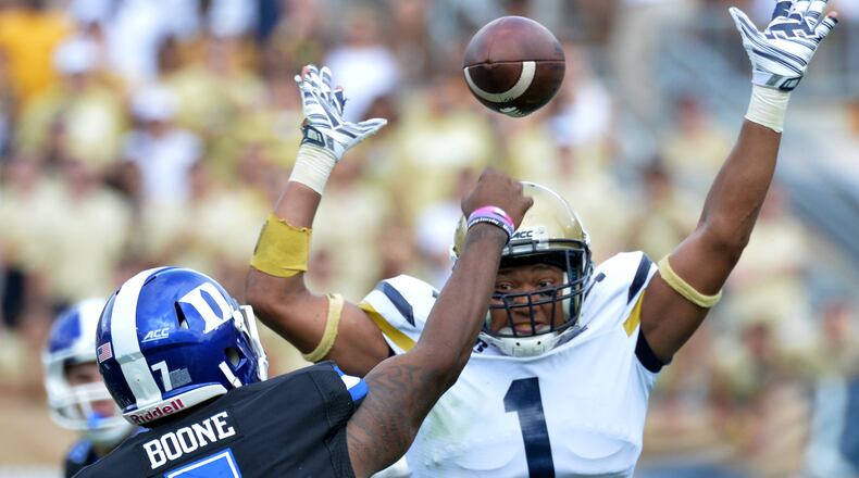 October 11, 2014 Atlanta - Duke Blue Devils quarterback Anthony Boone (7) gets off a pass against Georgia Tech Yellow Jackets safety Isaiah Johnson (1) in the first half at Bobby Dodd Stadium on Saturday, October 11, 2014. HYOSUB SHIN / HSHIN@AJC.COM Former Georgia Tech safety Isaiah Johnson was named to the All-ACC academic team following his final semester at Tech. (AJC photo by Hyosub Shin)