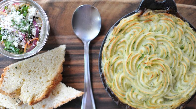 Fado Irish Pub executive chef, Bryan McAlister, makes Shepherd’s Pie with ground beef and vegetables in a rich sauce topped with colcannon. PHOTO CREDIT: Fado Irish Pub