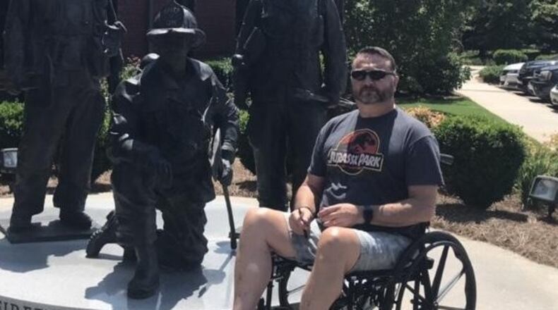 Johnnie Martin has become wheelchair-bound since being diagnosed with Devic's disease.