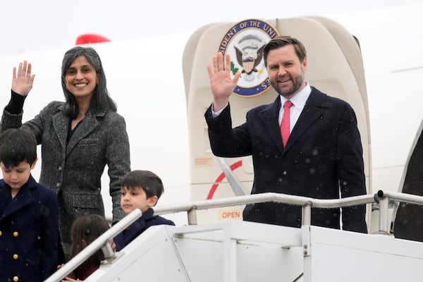 FILE - U.S. Vice President JD Vance and second lady Usha Vance, with their children Ewan, Vivek and Mirabel, wave as they arrive at the Munich airport in Munich, Germany, Feb. 13, 2025. (AP Photo/Matthias Schrader, File)