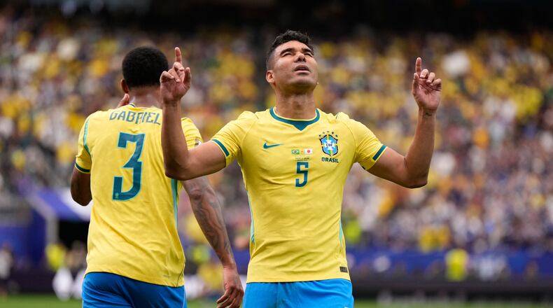 Brazil's Casemiro (5) celebrates after scoring his side's first goal during the World Cup round of 32 soccer match between Brazil and Japan in Houston, Monday, June 29, 2026. (AP Photo/Ashley Landis)