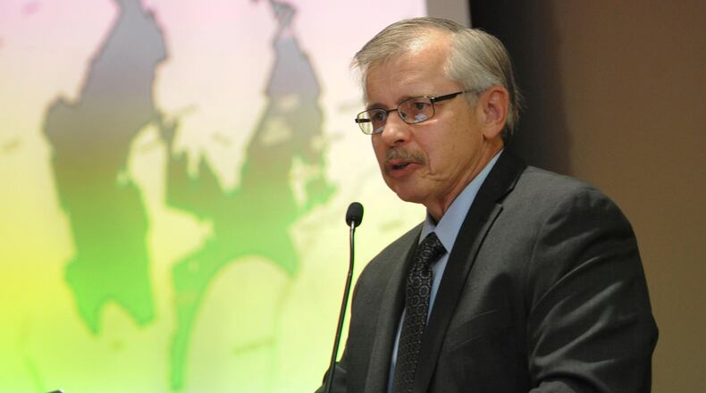David Popp, a member of Fair Districts PA, Bedford County, gives examples of changing Congressional districts during a public forum on redistricting at the University of Pittsburgh and Johnstown in Johnstown, Pa., Tuesday, Feb. 6, 2018. (John Rucosky/The Tribune-Democrat via AP)