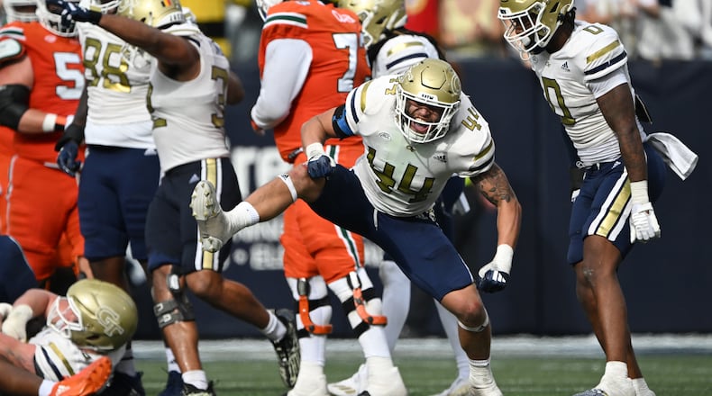 Georgia Tech linebacker Kyle Efford (44) celebrates after sacking Miami quarterback Cam Ward during the second half of an NCAA college football game at Georgia Tech's Bobby Dodd Stadium, Saturday, November 9, 2024, in Atlanta. Georgia Tech won 28-23 over Miami. (Hyosub Shin / AJC)