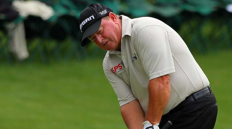 Ian Woosnam hits on the green during the 2013 Masters.