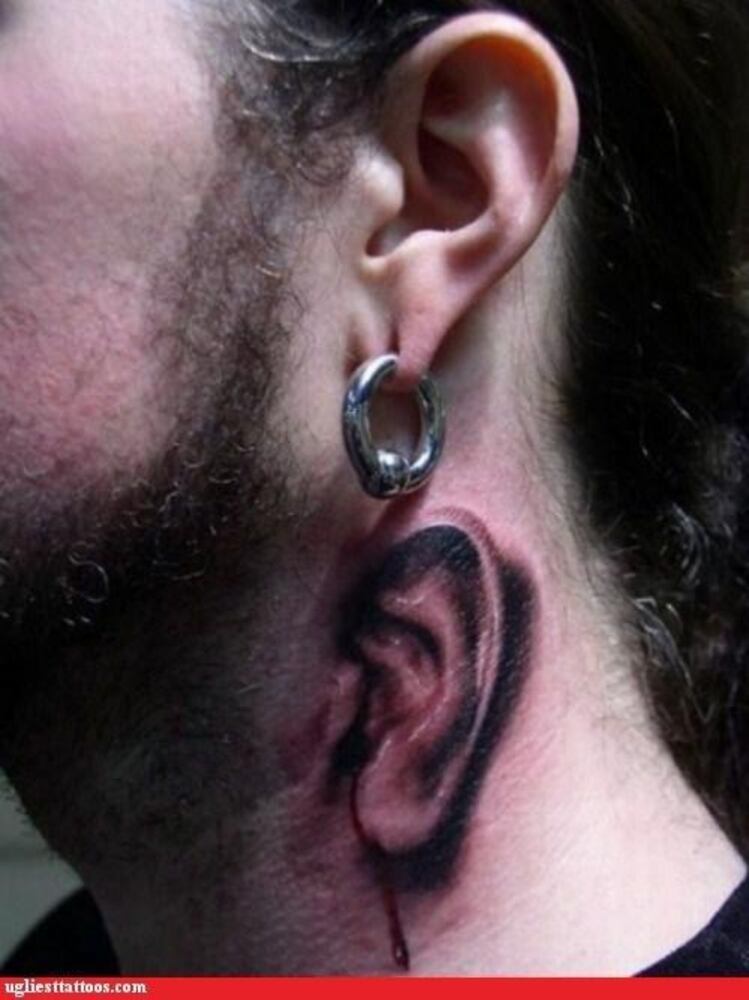 These tattoos are from Ugliesttattoos.com.