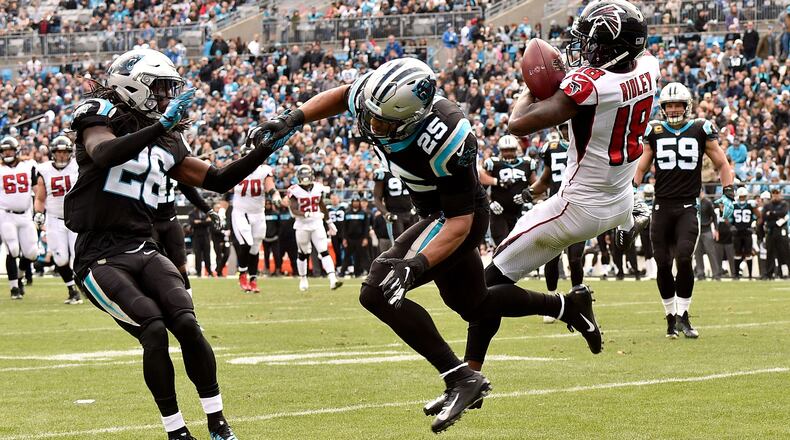 Panthers' Eric Reid (25) breaks up a pass to Falcons' Calvin Ridley in the second quarter during Sunday, Dec. 23, 2018, at Bank of America Stadium in Charlotte, N.C.