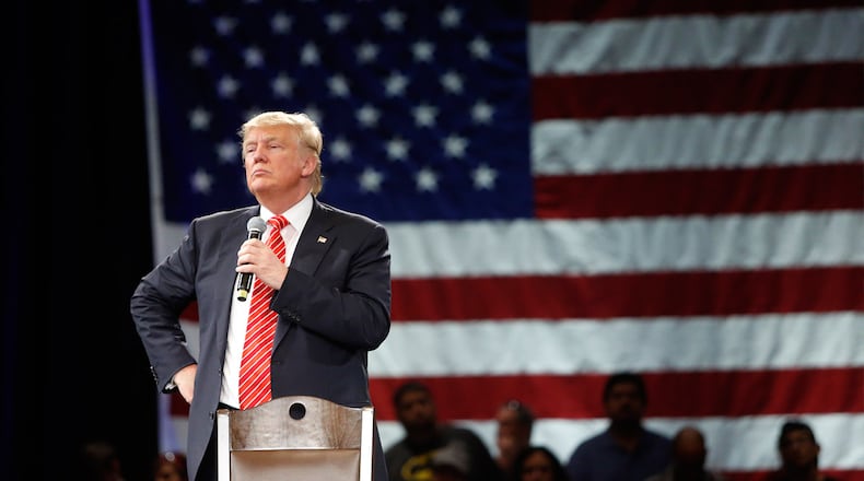 Republican presidential candidate Donald Trump speaks to supporters during a town hall meeting on March 14, 2016 at the Tampa Convention Center in Tampa , Florida. Trump is campaigning ahead of the Florida primary on March 15. (Photo by Brian Blanco/Getty Images)