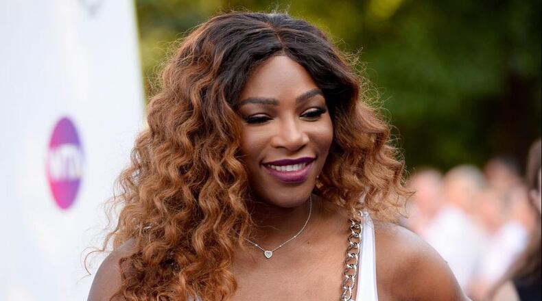 Serena Williams was a surprise guest at a polo match as she and friend Meghan Markle cheered on Prince Harry.