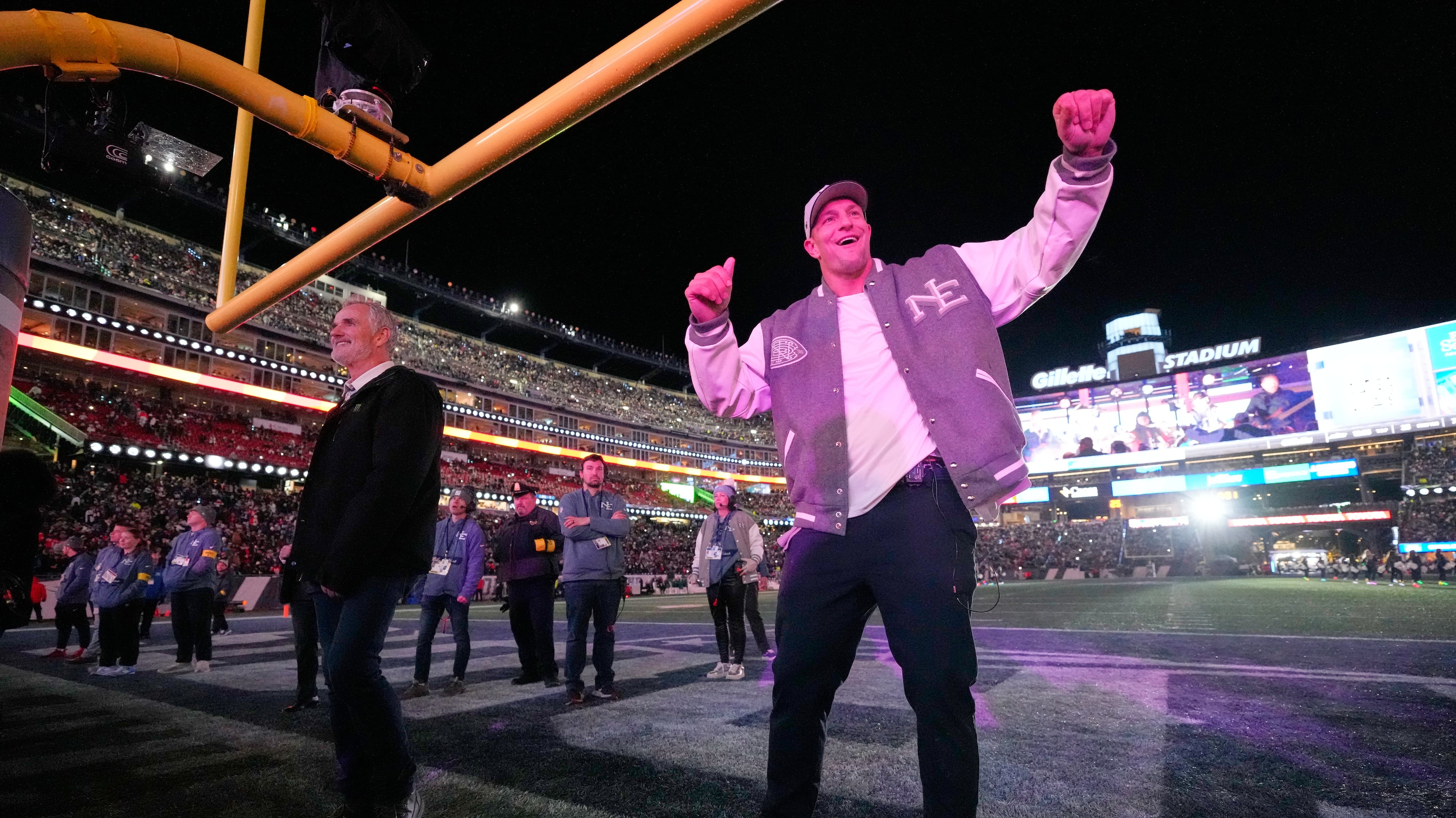 Former NFL tight end Rob Gronkowski dances during halftime of an NFL football game between the New England Patriots and the New York Jets, Thursday, Nov. 13, 2025, in Foxborough, Mass. (AP Photo/Robert F. Bukaty)