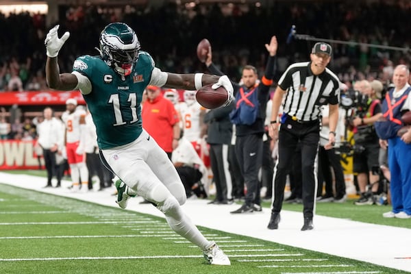 FILE - Philadelphia Eagles wide receiver A.J. Brown (11) scores a touchdown during the first half of the NFL Super Bowl 59 football game against the Kansas City Chiefs, Sunday, Feb. 9, 2025, in New Orleans. (AP Photo/Abbie Parr, File)