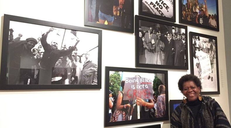 Photographer and founder of Sistagraphy Shelia Turner with some of her work. CREDIT: SUSAN ROSS