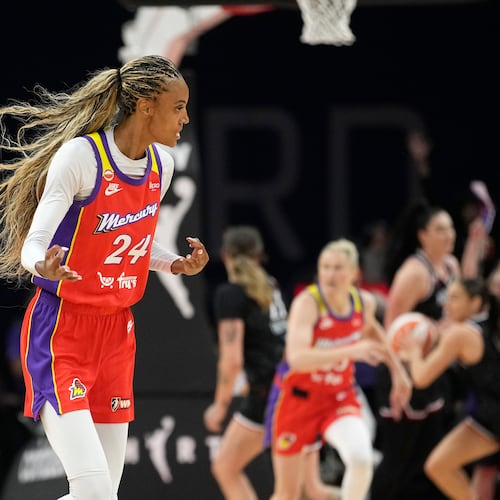 Phoenix Mercury forward-guard DeWanna Bonner (24) celebrates a 3-pointer against the Portland Fire during the first half of a WNBA basketball game, Sunday, Aug. 16, 2026, in Phoenix. (AP Photo/Ross D. Franklin)