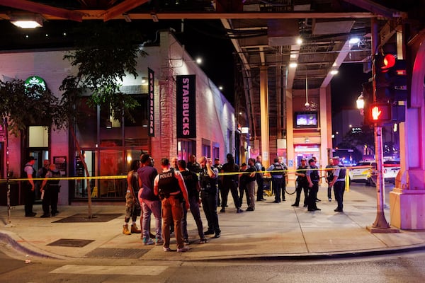 Officers work the scene of a shooting Wednesday, July 2, 2025, in Chicago. (Armando L. Sanchez/Chicago Tribune via AP)