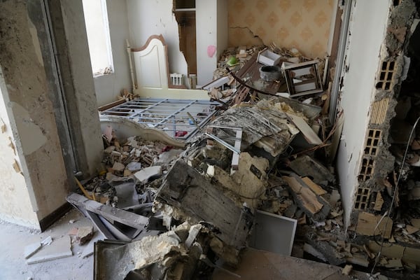 Damages of a building are seen in Tehran, Iran, Wednesday, June 25, 2025, after an Israeli strike on early Tuesday. (AP Photo/Vahid Salemi)