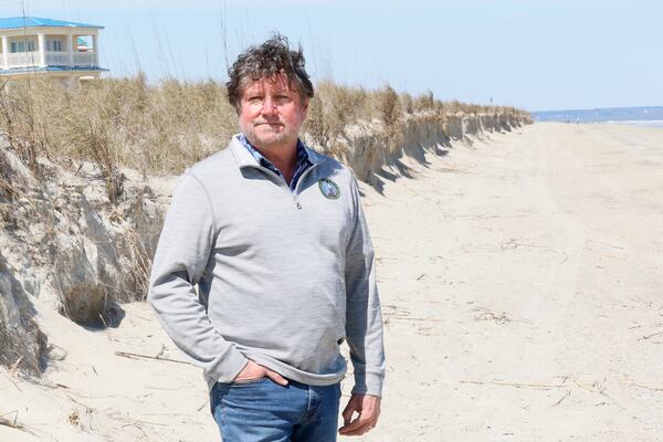 Tybee Island Mayor Brian West stands in front of a blocked public access point at Mid Beach.
(Miguel Martinez/AJC)