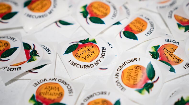 FILE -- Stickers for voters in the Georgia primary election in Atlanta, March 12, 2024. Vote history data in Georgia supports the polling that’s showing President Joe Biden doing well among highly engaged voters but lagging overall. (Nicole Craine/The New York Times)