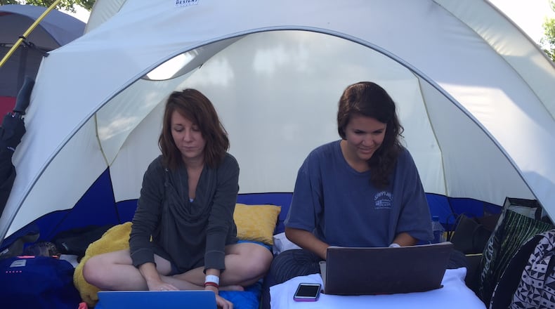 Atlanta residents Jodi Meadows and Shelby Dillon worked from their tent during a contest outside of the Ashford Dunwoody Road Chick-fil-A in 2015. A similar contest is scheduled this week at a new location on Cascade Road.