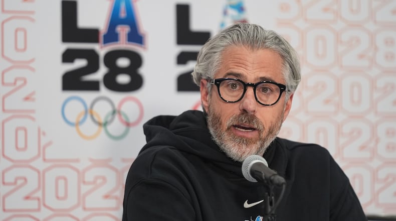 FILE - Casey Wasserman, LA28 chairperson and president, takes questions from the media during a news conference in Los Angeles, Thursday, June 5, 2025. (AP Photo/Damian Dovarganes, File)
