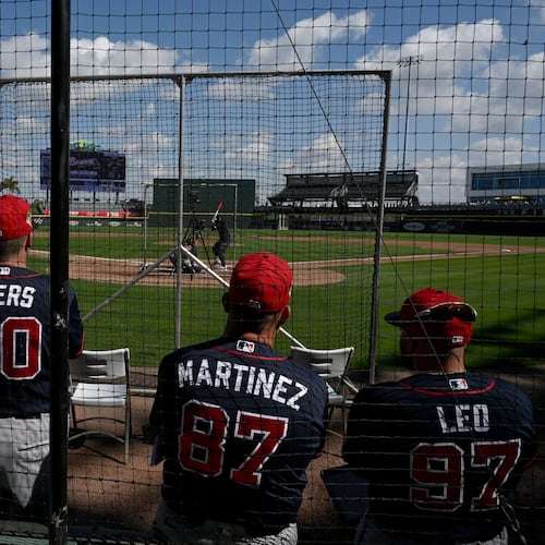 Atlanta Braves hitting coach Tim Hyers (second from left) and other coaching staff watch live batting practice session during spring training workouts at CoolToday Park, Saturday, Feb. 14, 2026, in North Port, Fla. (Hyosub Shin/AJC)