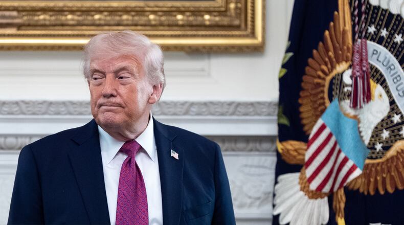 President Donald Trump departs after speaking at an event for NCAA national champions in the State Dining Room of the White House, Tuesday, April 21, 2026, in Washington. (AP Photo/Alex Brandon)