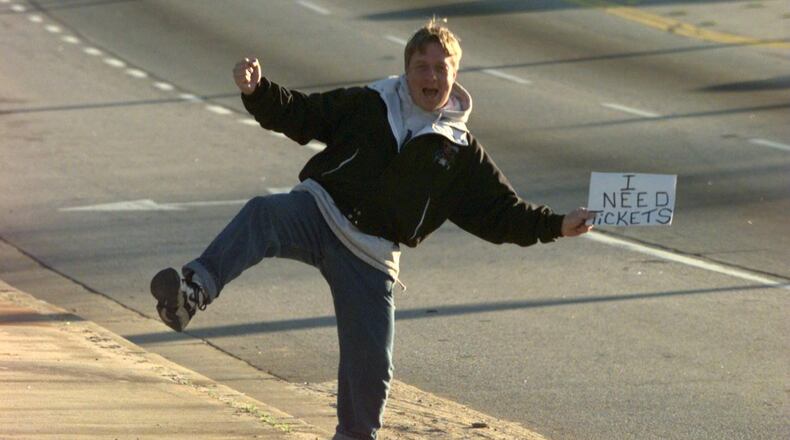 This is probably not the best way to find tickets to Saturday's big game. AJC file photo