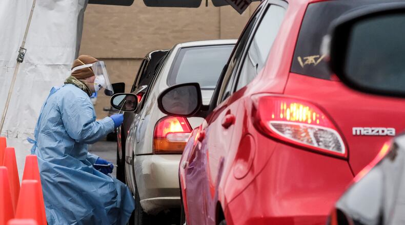Henry County has added a new drive-thru COVID-19 testing site at New Hope Cathedral in Stockbridge. (Matthew Hatcher/Getty Images/TNS)