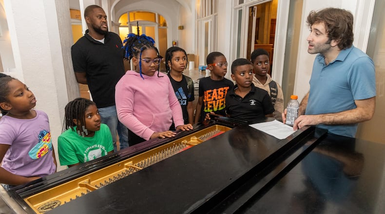 Jazz musician Joe Alterman (far right) answers questions about the piano at a summer camp at Callanwolde Fine Arts Center. PHIL SKINNER FOR THE ATLANTA JOURNAL-CONSTITUTION