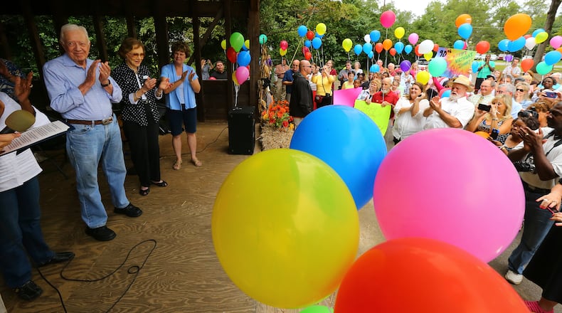 Jimmy Carter and Former First Lady Rosalynn Carter applaud during the former president’s 90th birthday celebration in Plains in 2014. There’s no such party planned in the little Southwest Georgia town for Carter’s 92nd birthday on Saturday, but there are several other events where the public can celebrate his big day.CURTIS COMPTON / CCOMPTON@AJC.COM