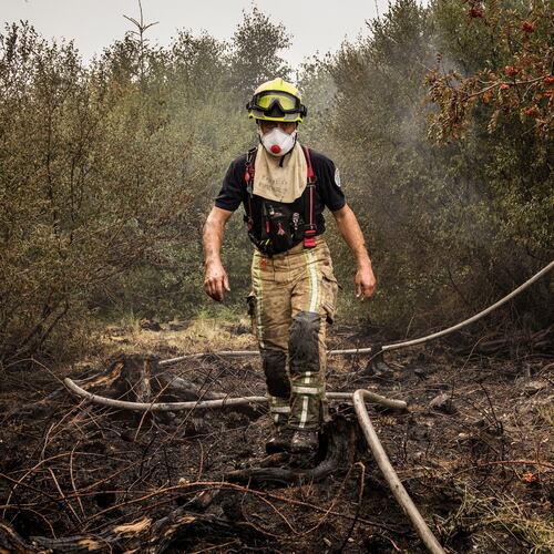 Firefighter work to extinguish wildfires at Hautes Fagnes near Waimes, Belgium, Sunday, Aug. 16, 2026. (Photo AP/Valentin Bianchi)