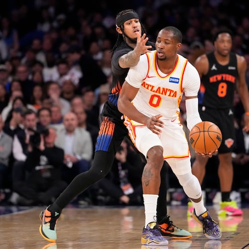 Hawks forward Jonathan Kuminga attempts to drive past Knicks guard Jordan Clarkson during the first half of Game 2 of a first-round playoff series April 20, 2026 in New York. He scored 19 points in the Hawks' victory. (Yuki Iwamura/AP)