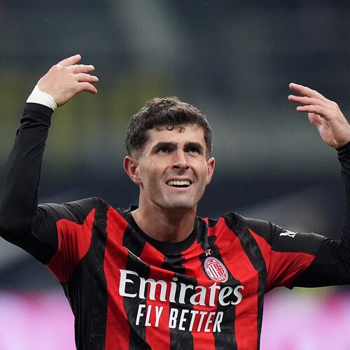 AC Milan's Christian Pulisic celebrates after scoring during the Serie A soccer match between Inter Milan and AC Milan in Milan, Italy, Sunday, Nov. 23, 2025. (Spada/LaPresse via AP)