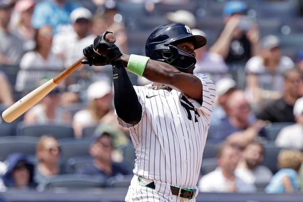 New York Yankees' Jazz Chisholm Jr. hits a three-run triple during the third inning of a baseball game against the Athletics, Sunday, June 29, 2025, in New York. (AP Photo/Adam Hunger)