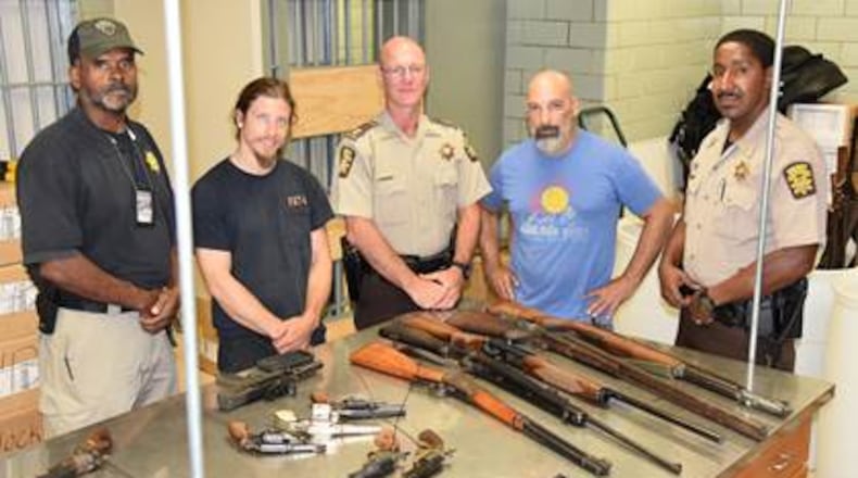 On July 23, 2017, Lt. Chuck Martin, metal artist Patrick Toups, Capt. Dan Cochran, pub owner Michael Jakob and Deputy Brandon Lewis selected the most suitable firearms collected during the buyback to be used during the iron pour.
