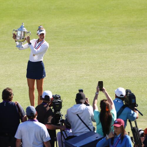 Nelly Korda holds the trophy after winning the U.S. Women's Open golf tournament Sunday, June 7, 2026, in the Pacific Palisades area of Los Angeles. (AP Photo/Jessie Alcheh)