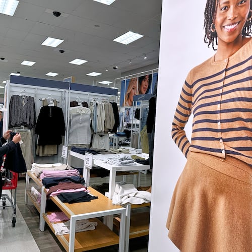 FILE - A shopper shops at a retail store in Arlington Heights, Ill., Tuesday, Sept. 23, 2025. (AP Photo/Nam Y. Huh, File)