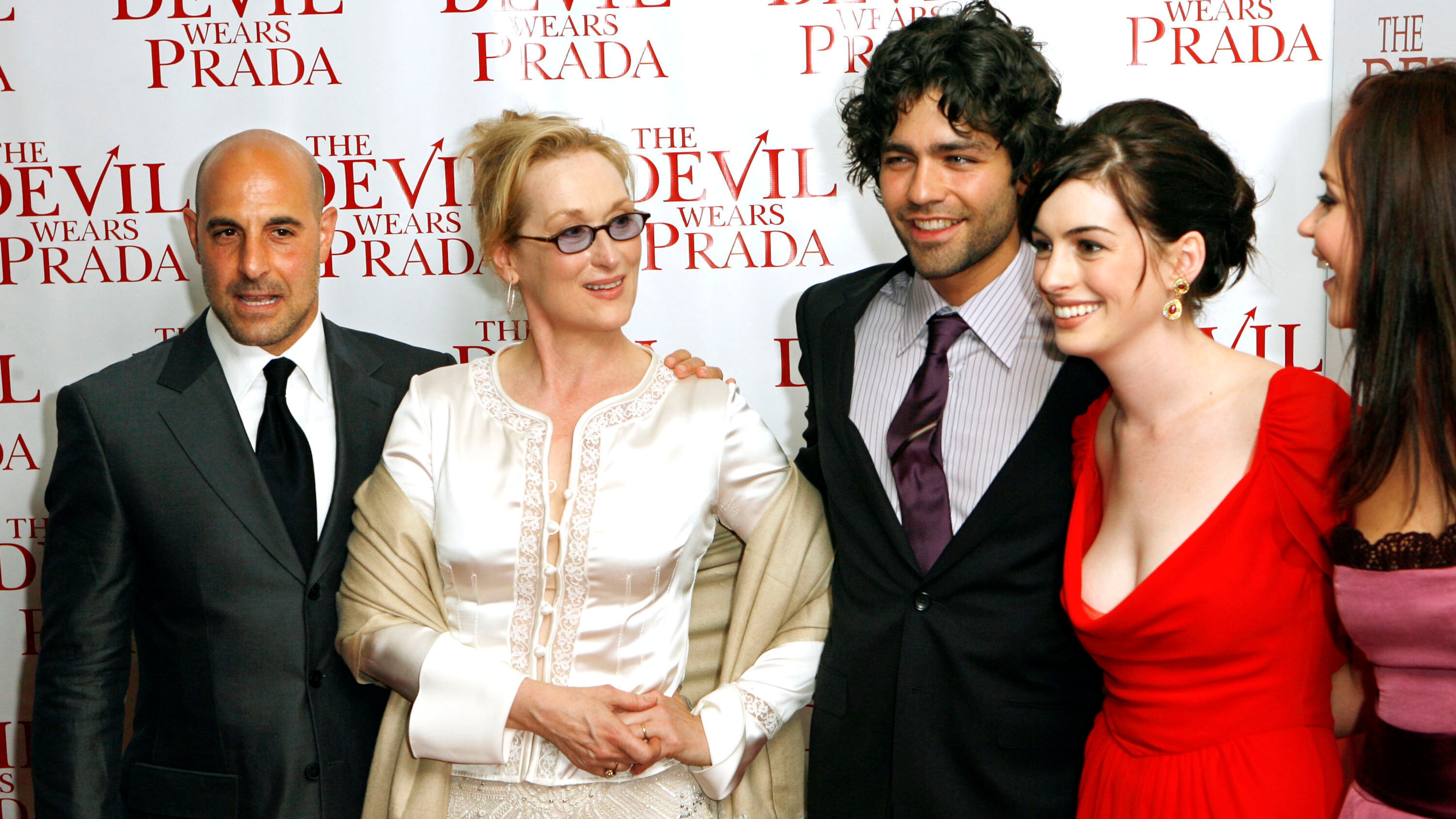 FILE - Cast members from left to right, Stanley Tucci, Meryl Streep, Adrian Grenier, Anne Hathaway, and Emily Blunt, pose for photographers during the red carpet arrivals for the New York premiere of the film titled "The Devil Wears Prada," Monday, June 19, 2006. (AP Photo/Stuart Ramson, File)