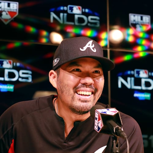Kurt Suzuki — pictured during a news conference with the Braves during the 2018 NL Division Series —  is reportedly the new manager of the Los Angeles Angels after spending his postretirement career with the club as a special assistant to the general manager.  (Curtis Compton/AJC 2018)